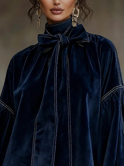 Carolina | Vestido de ante con cuello alto y flecos