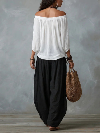 Clara | Ensemble blanc épaules dénudées et pantalon ample